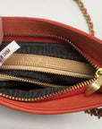 Pour La Victoire Coral & Tan Woven Leather Crossbody Bag