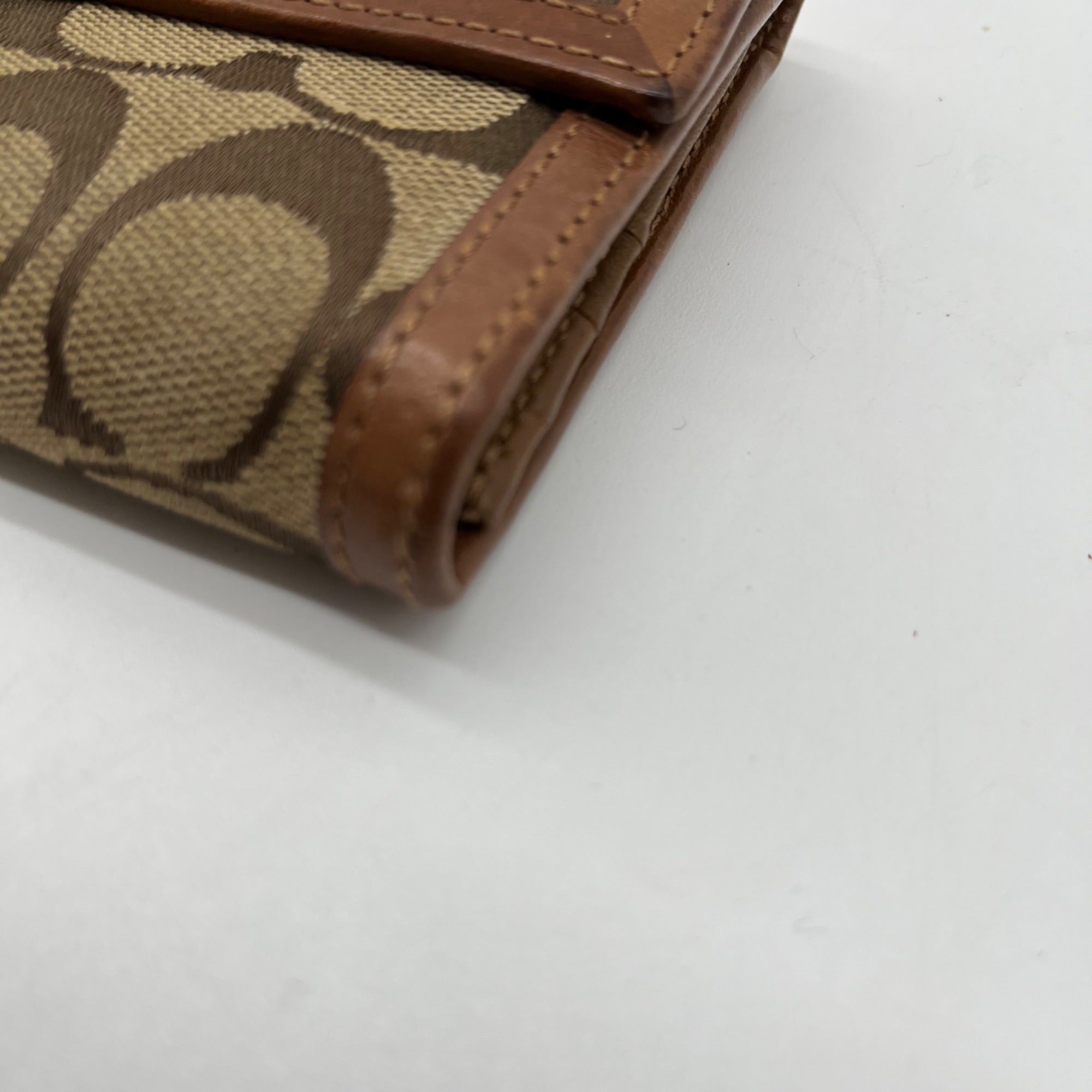 Coach Vintage Signature Soho Buckle Trifold Wallet