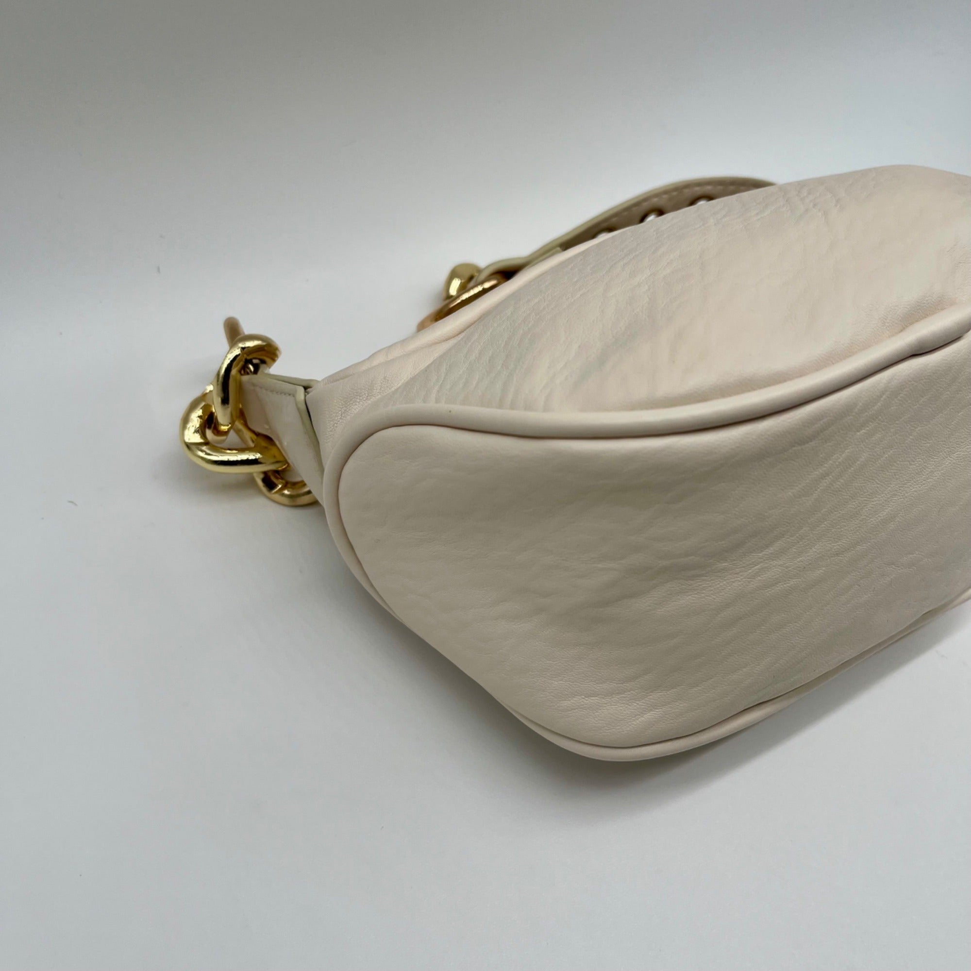 MMS Brands Cream Leather Studded Crescent Shoulder Bag