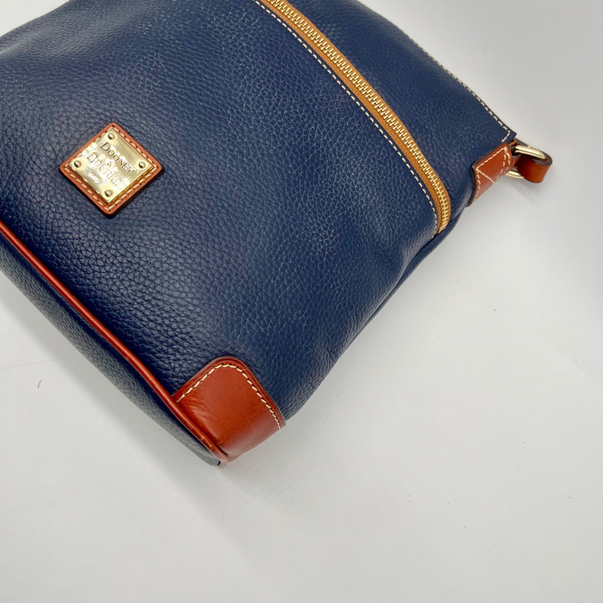 Dooney And Bourke Navy Pebbled Leather adjustable Crossbody