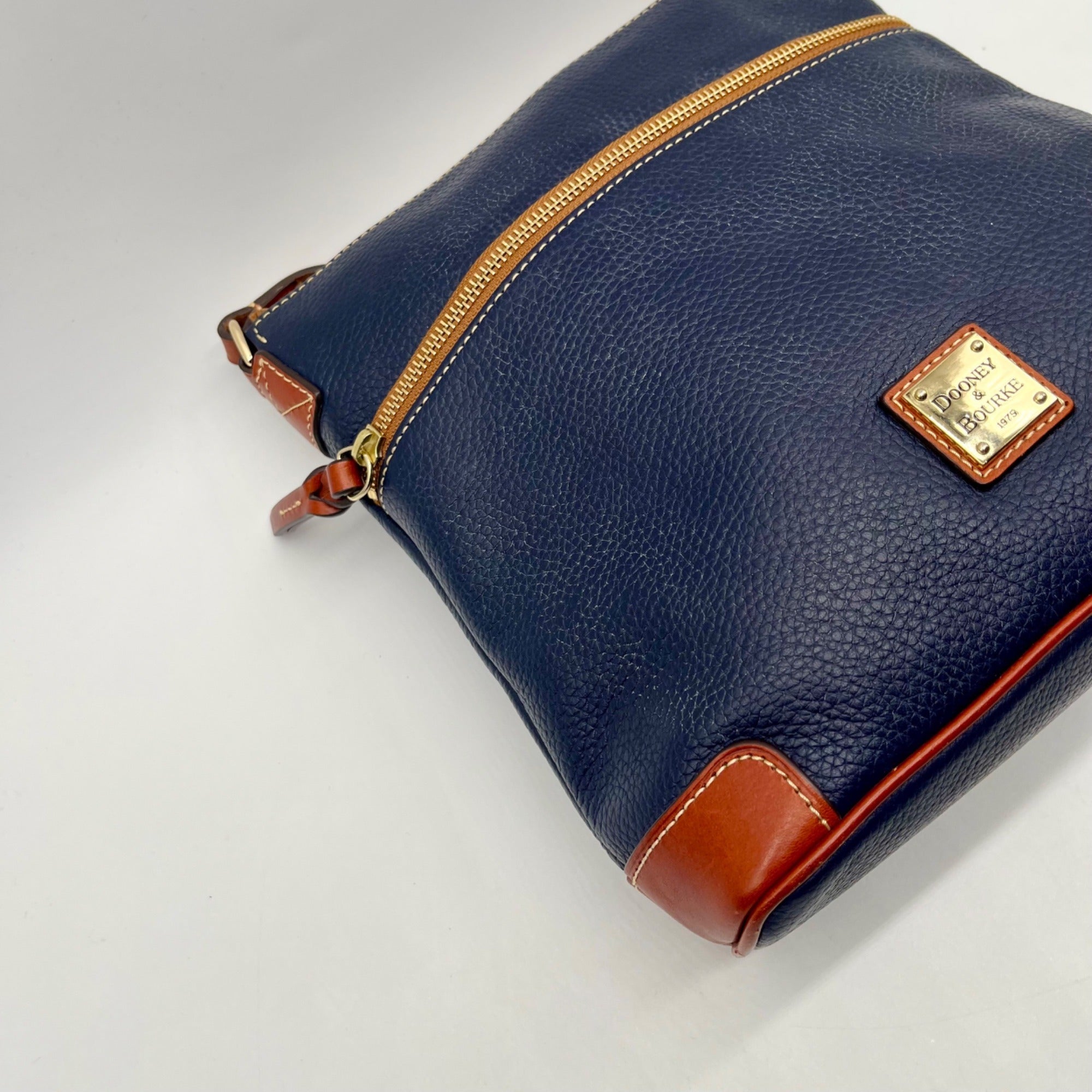 Dooney And Bourke Navy Pebbled Leather adjustable Crossbody