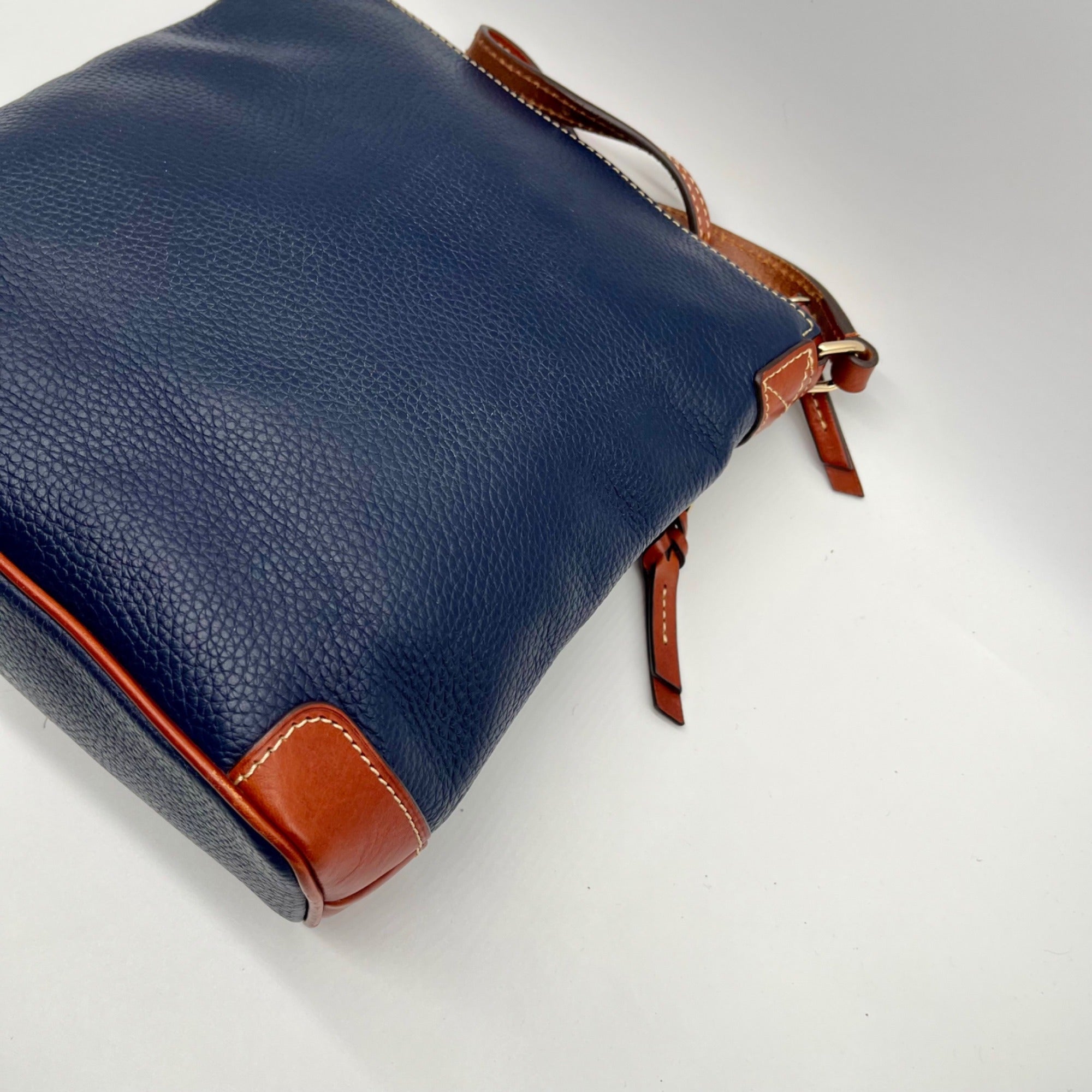 Dooney And Bourke Navy Pebbled Leather adjustable Crossbody