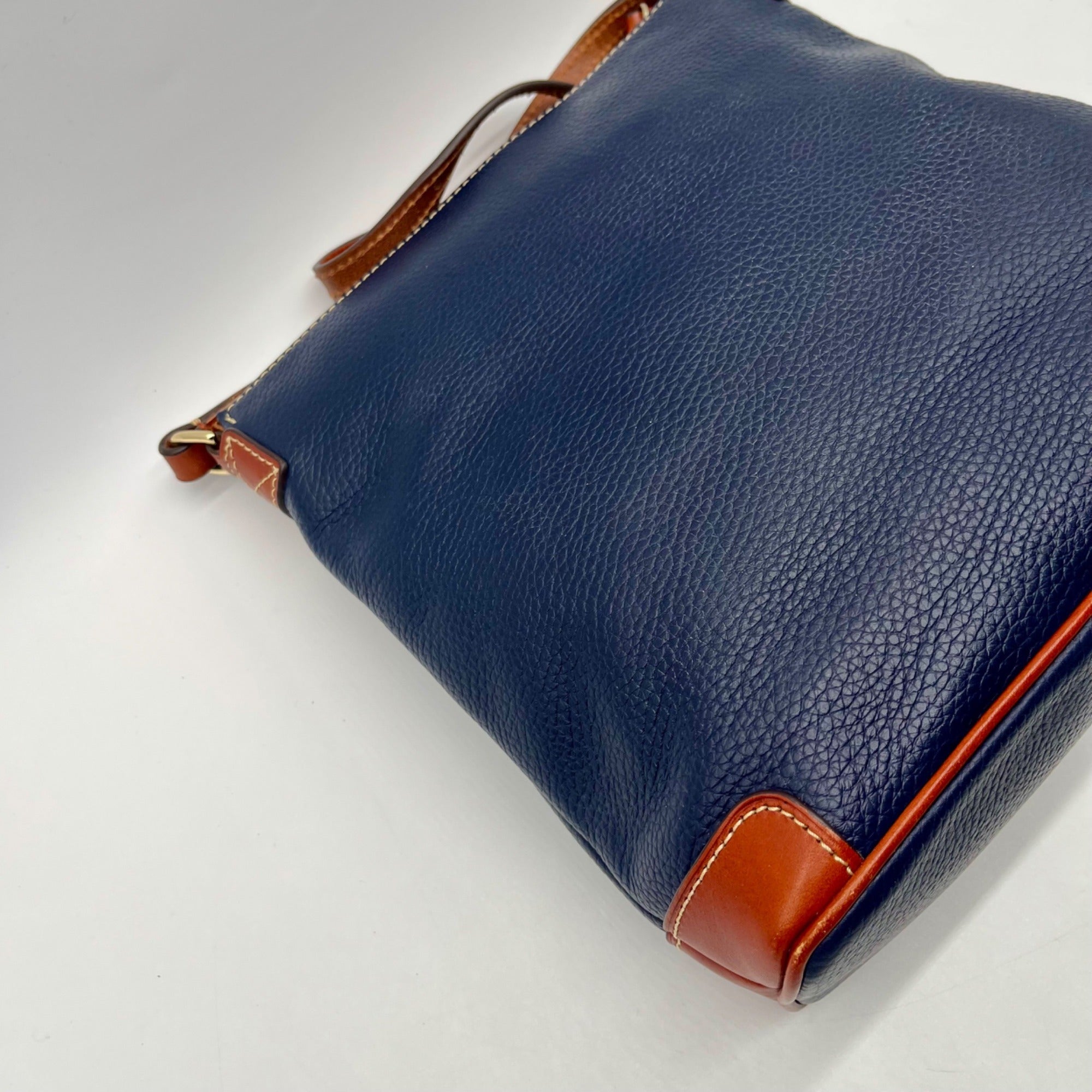 Dooney And Bourke Navy Pebbled Leather adjustable Crossbody