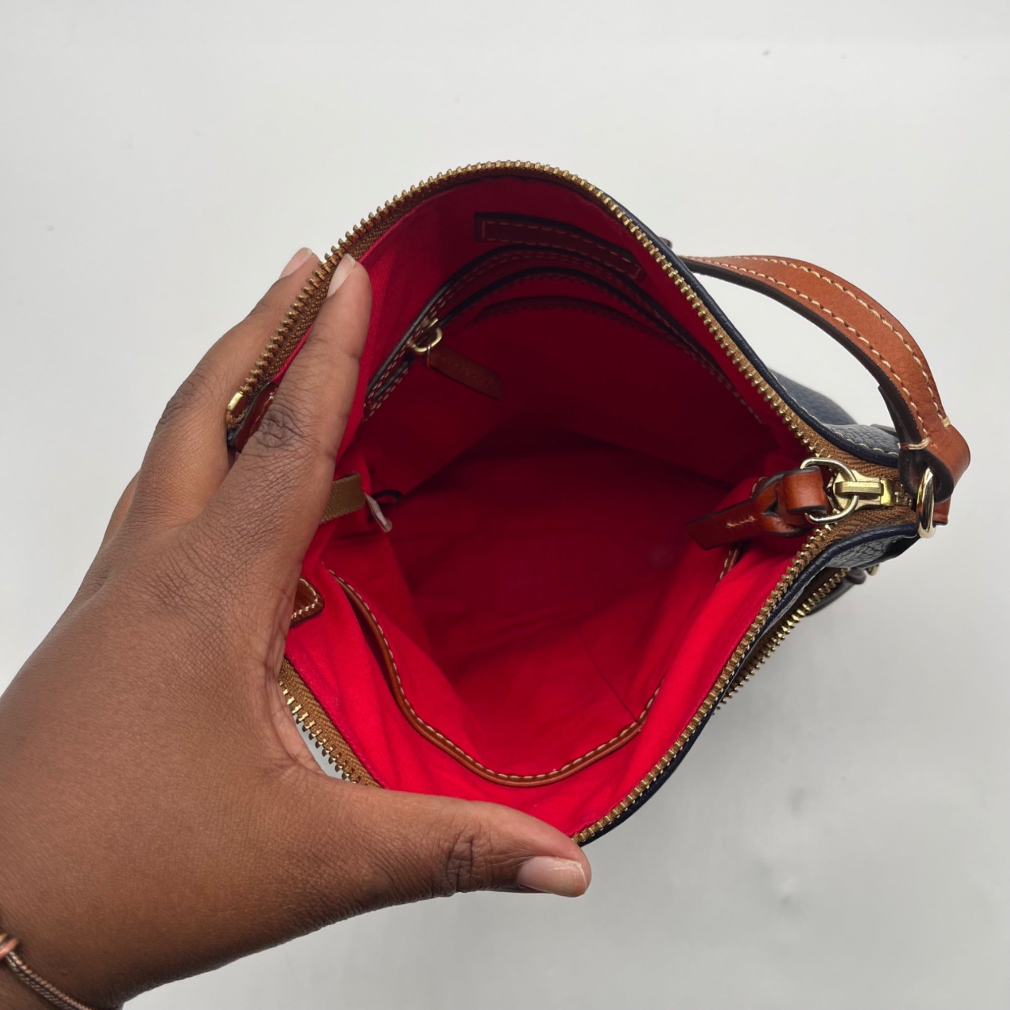 Dooney And Bourke Navy Pebbled Leather adjustable Crossbody