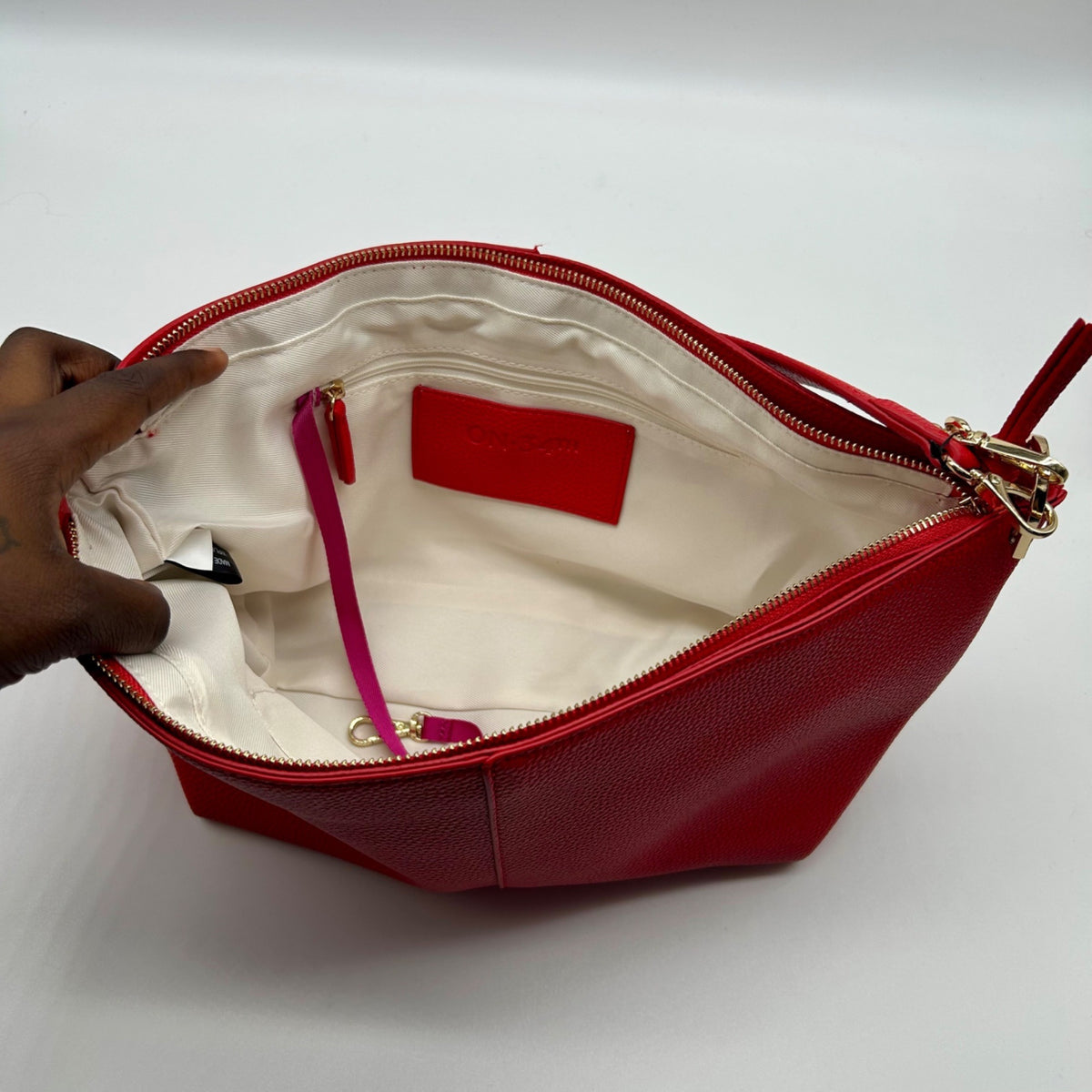 On 34th Red Pebbled Leather Shoulder Bag